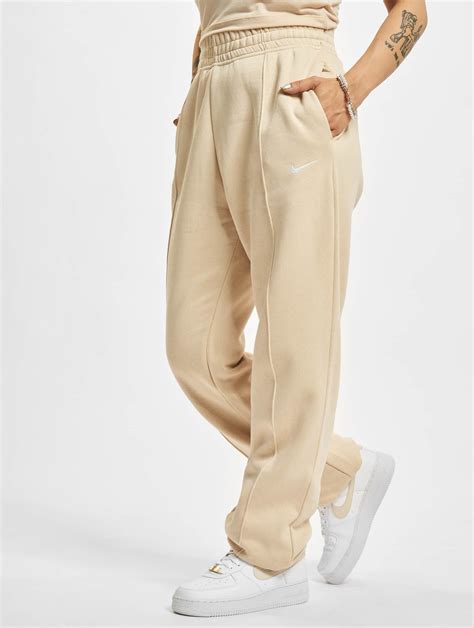 nike jogginghose damen mit knopfleiste|jogginghose damen hoch.